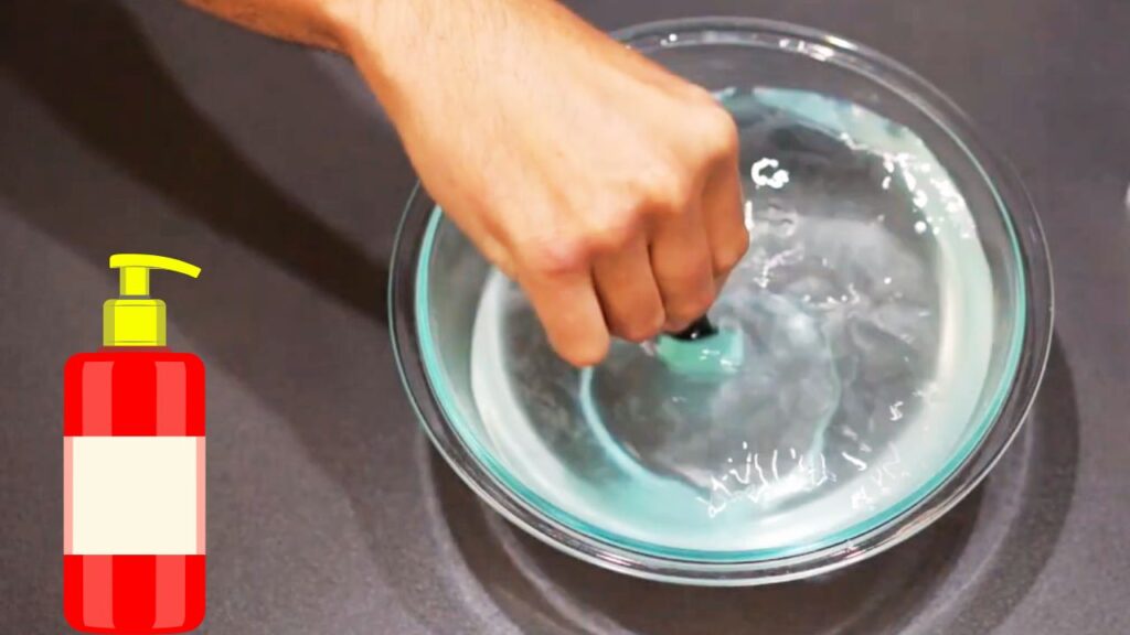 Mix warm water with a few drops of dog shampoo in a bowl.